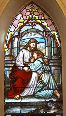 Витраж Иисуса, покидающего свою мать, в лютеранской церкви в Южной Каролине.