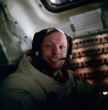 Photo of Armstrong smiling in his spacesuit