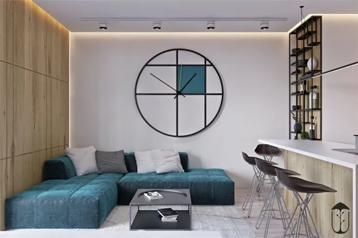 Элемент декора интерьера в конструктивизме в виде круглых настенных часов