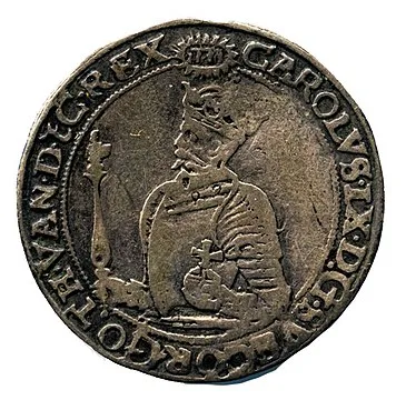 Coin from 1607 depicting Charles IX with the royal orb and scepter