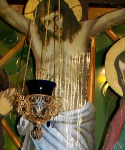 Мироточащее тело Иисуса Христа на Голгофском кресту